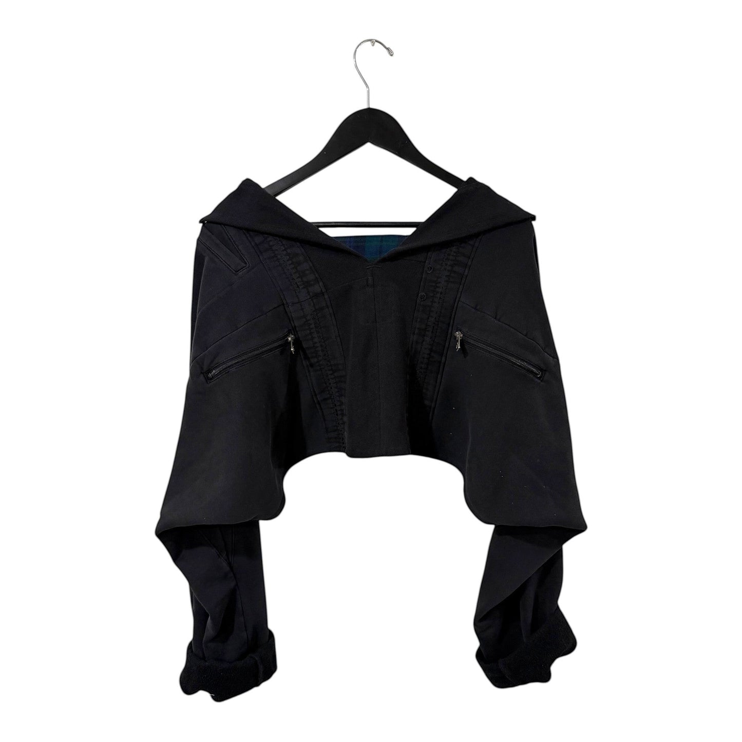 0 mph black cropped layered jacket with structured collar, zippered pockets, and hidden plaid interior lining.