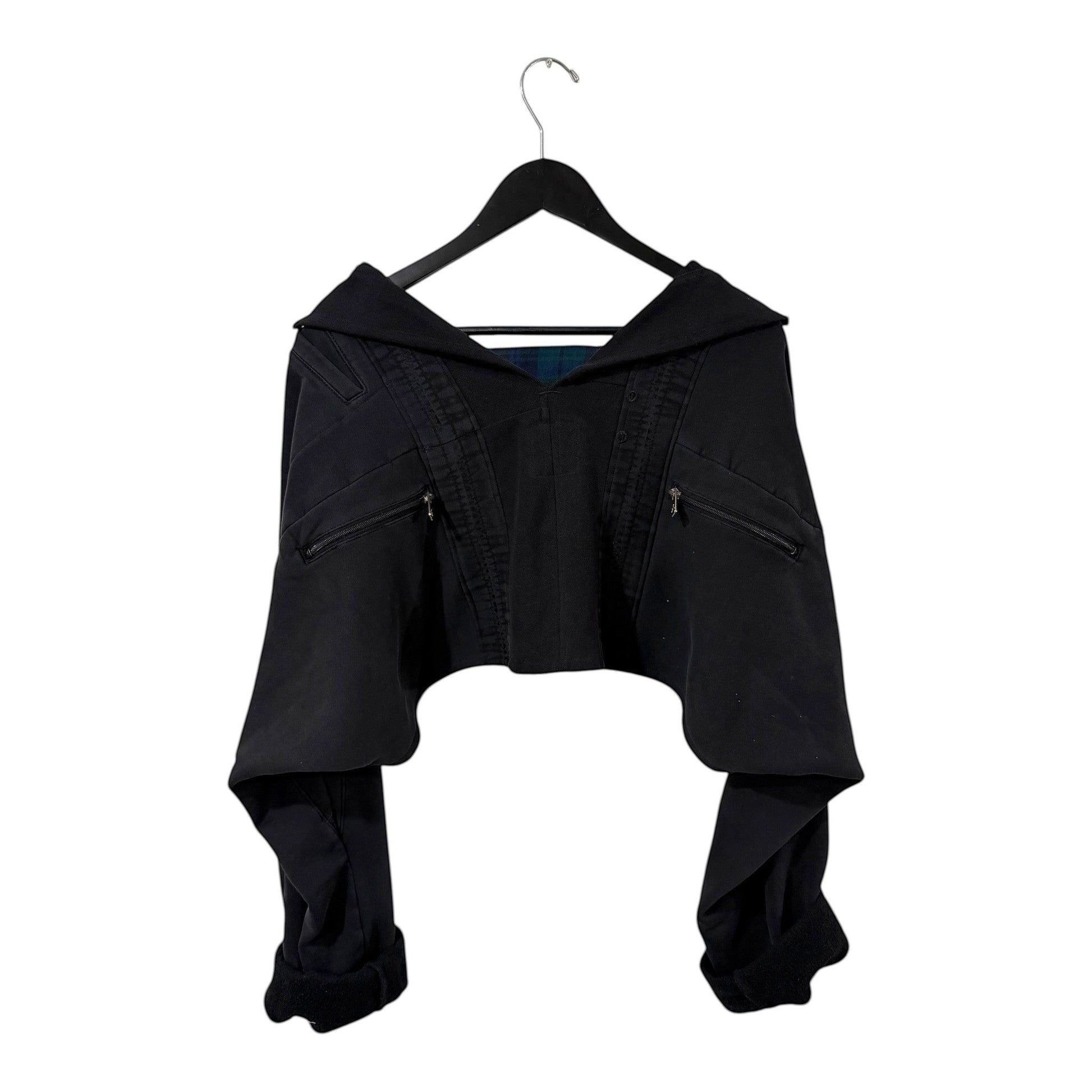 0 mph black cropped layered jacket with structured collar, zippered pockets, and hidden plaid interior lining.