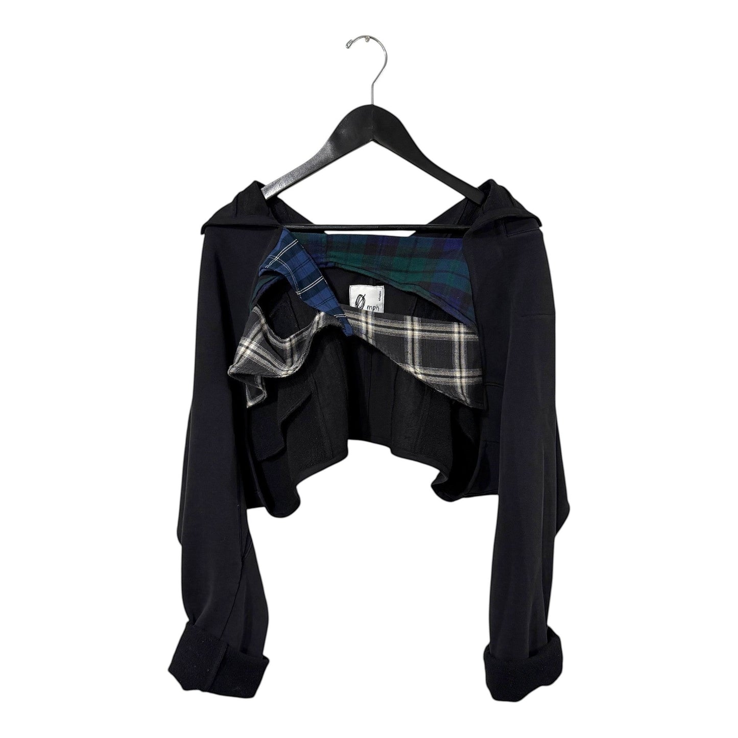 0 mph black cropped layered jacket with deconstructed plaid interior detailing on a hanger.