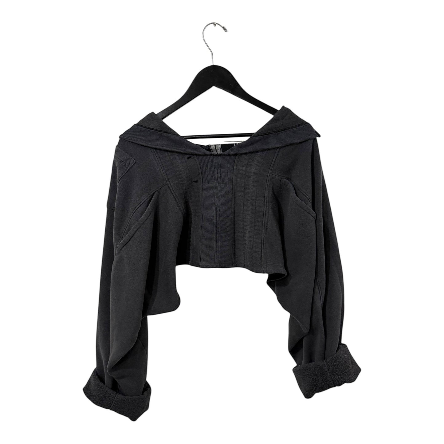 0 mph charcoal grey deconstructed cropped sweatshirt with corset-style bodice and voluminous sleeves on a hanger.
