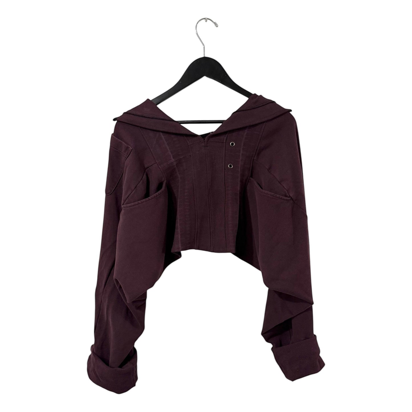 0 mph plum cropped long sleeve hoodie with deconstructed layered design and button details on a black hanger.