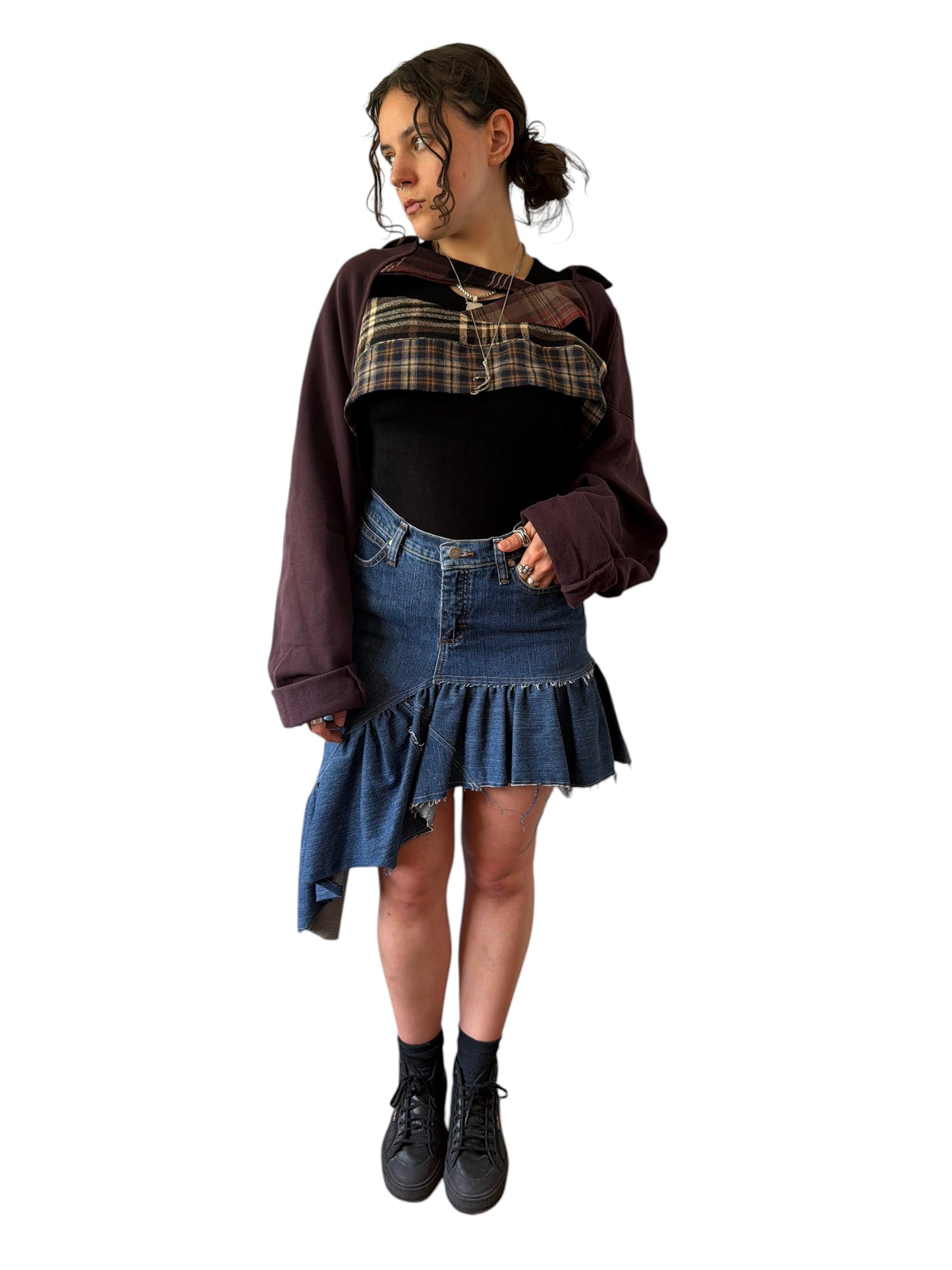 0 mph shrugly made from upcycled flannel and pants scraps, worn by a model over a black top and denim skirt.