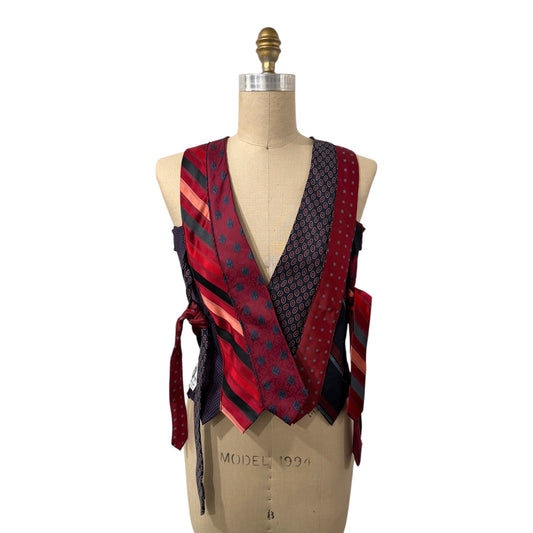 0 mph upcycled corset top made from red and navy patterned vintage neckties with adjustable side tie closures.