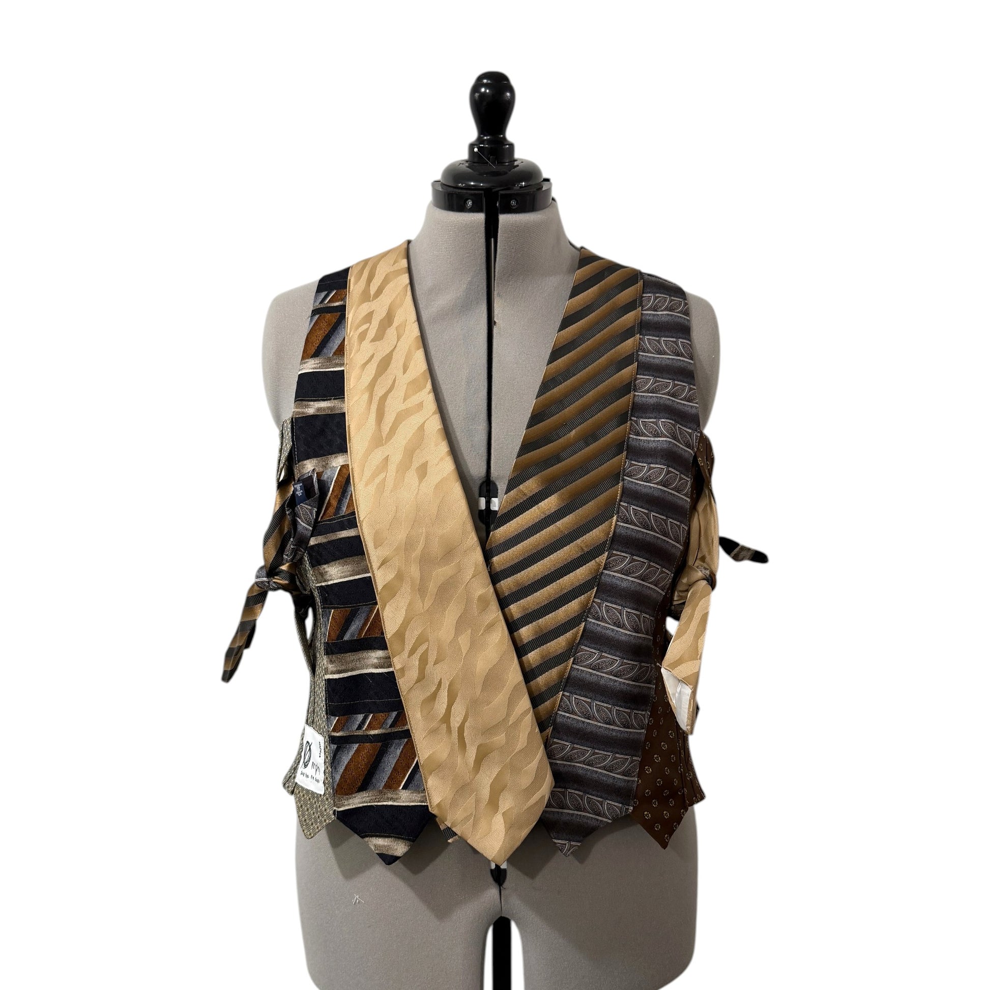 0 mph upcycled patchwork vest made from silk neckties in earthy brown, black, and gold tones with side-tie closures.