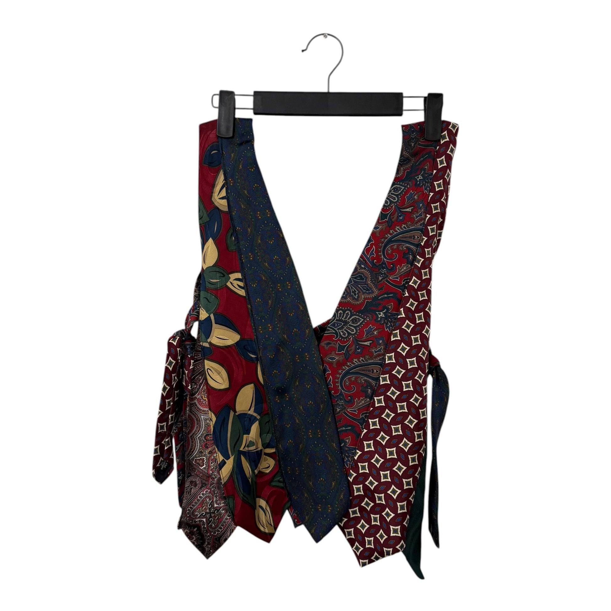 0 mph upcycled necktie vest featuring a patchwork of vintage silk ties in red, blue, and floral paisley patterns.