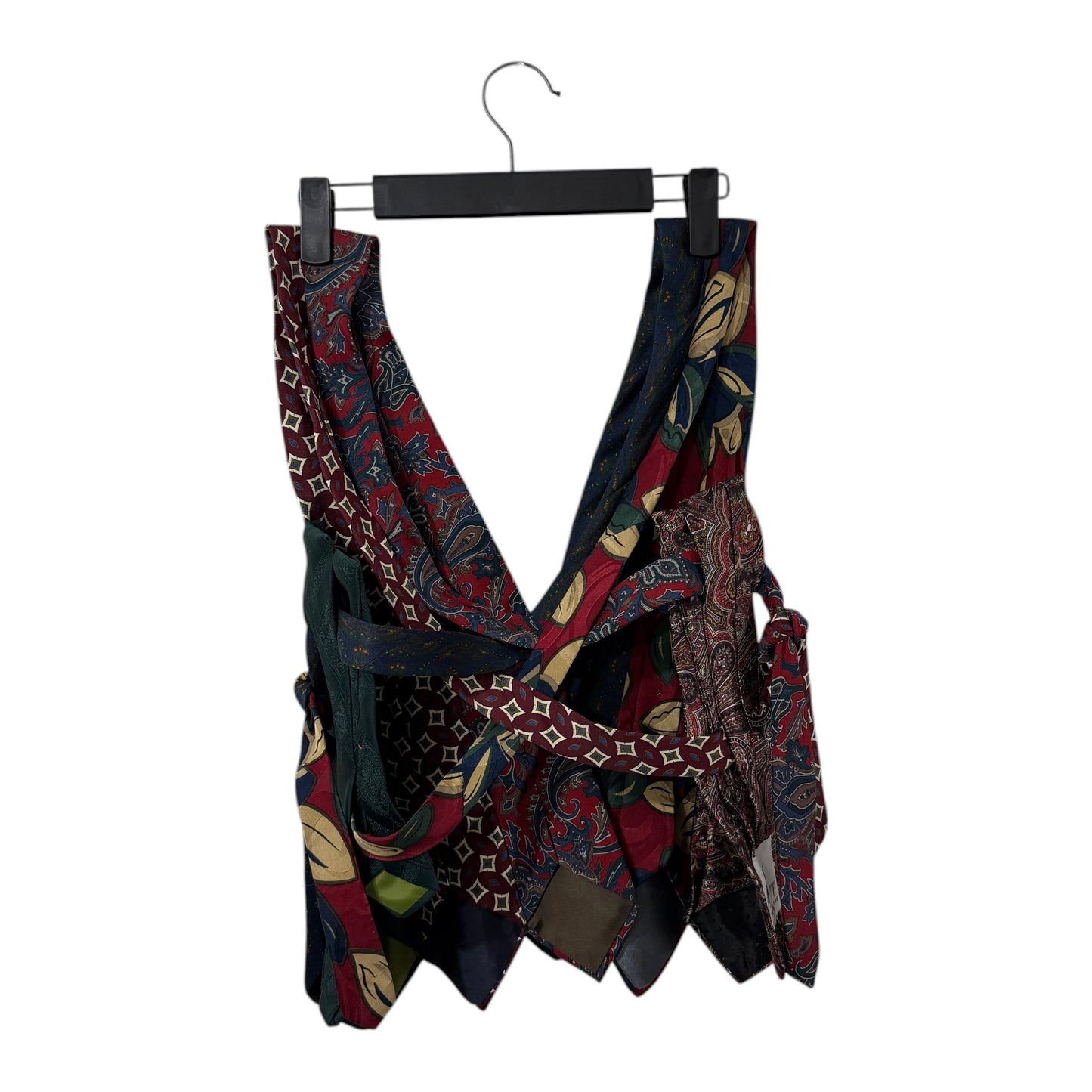 0 mph upcycled necktie vest featuring a patchwork of vintage silk-style ties in red, blue, and earthy floral patterns.