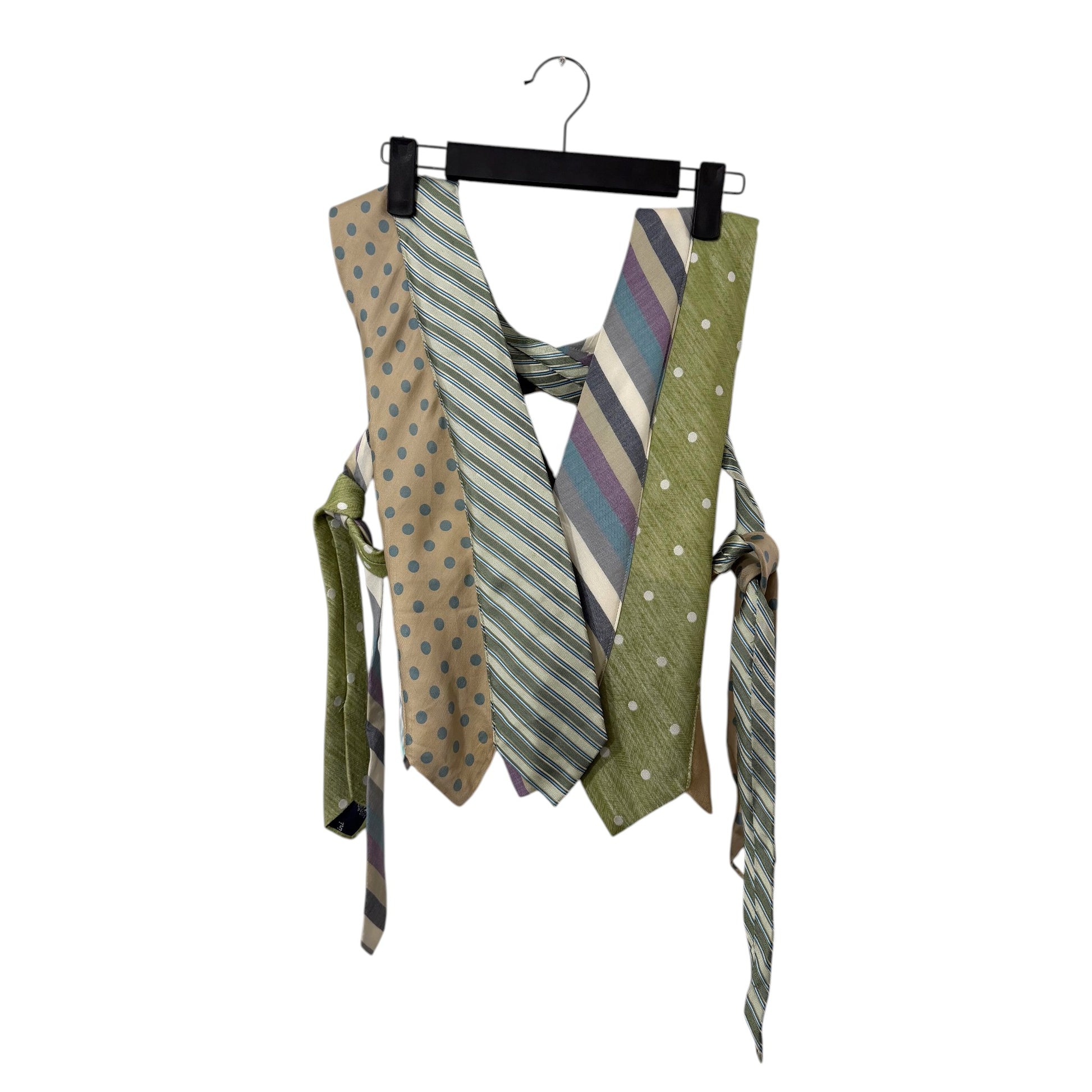 0 mph upcycled necktie vest in sage green, tan, and blue with polka dot and stripe patterns and side-tie closure.